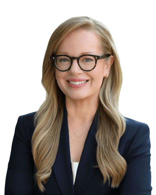 Professional headshot of Anne Patterson against a white background.